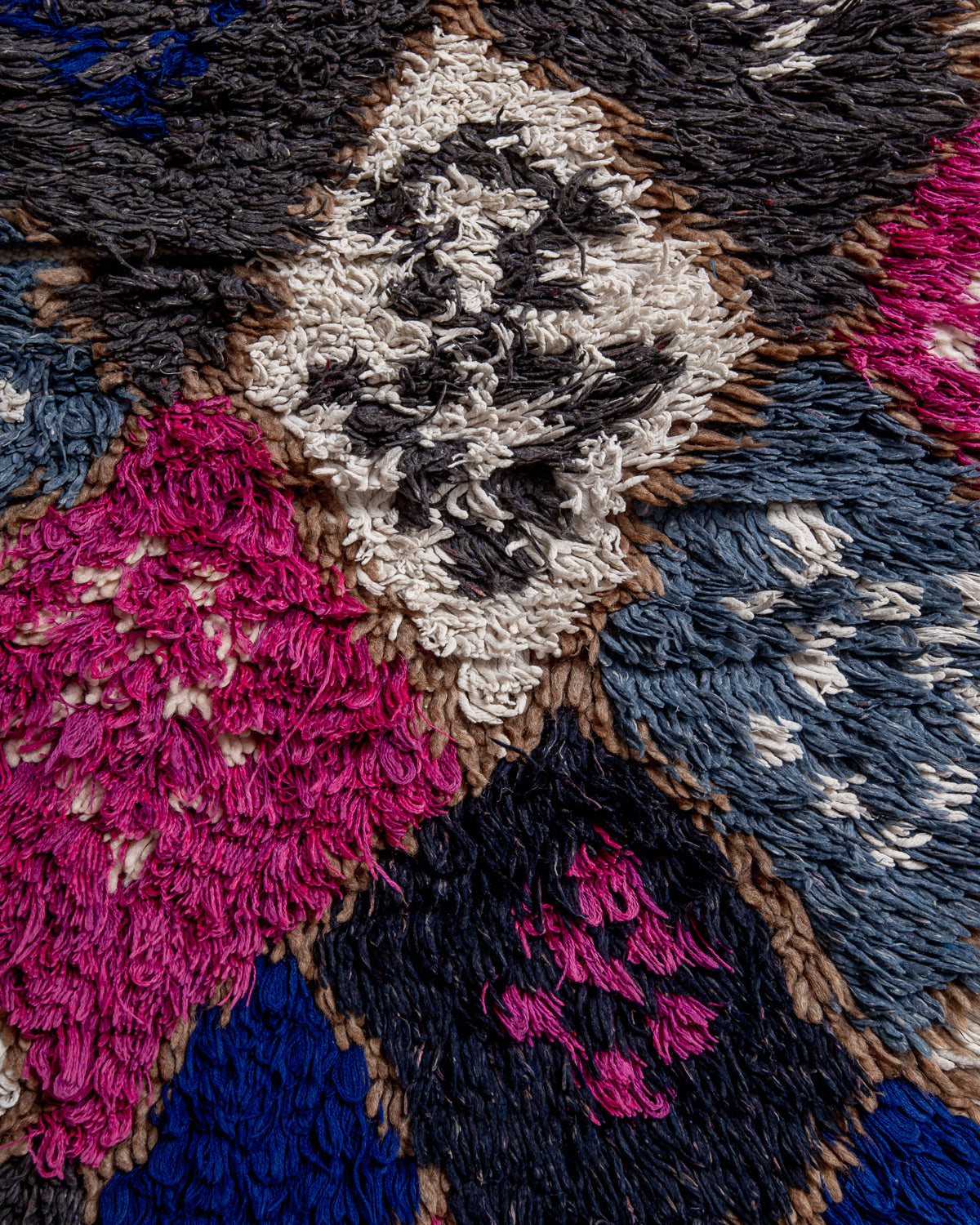 Modern designer vintage handcrafted Berber rug from Morocco. Boucherouite with beautiful colors and patterns.